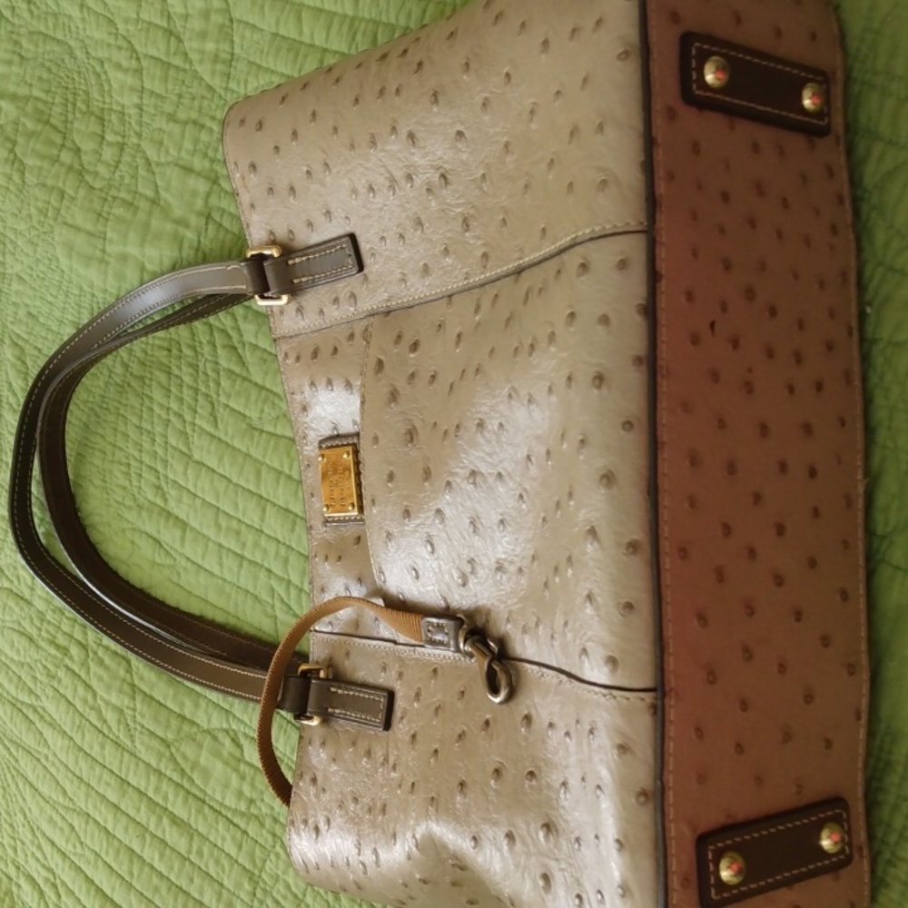 Dooney& Bourke Ostrich print hand bag in excellent condition Dust bag included.